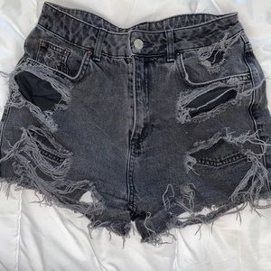 Distressed black denim shorts